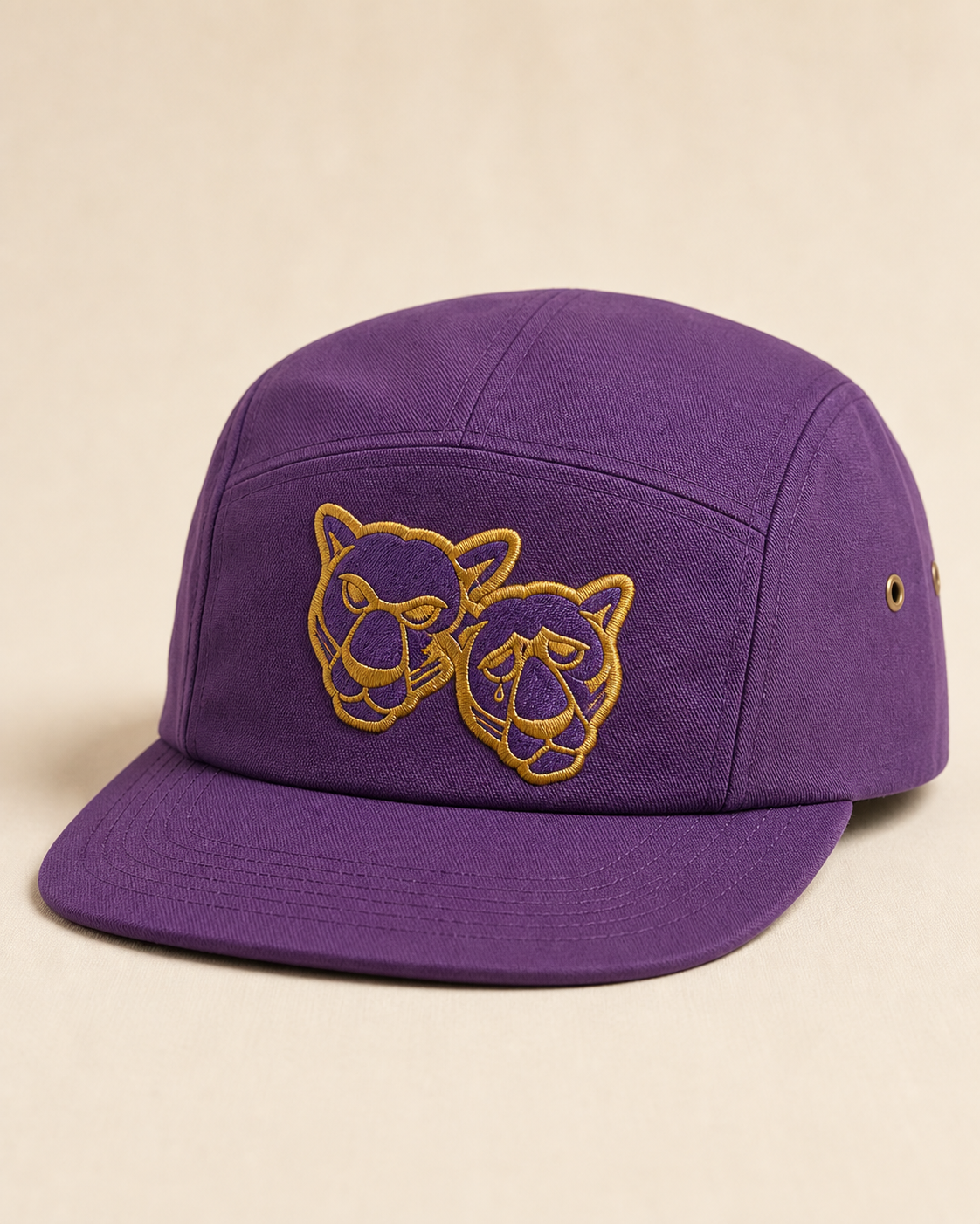 Paschal Purple five-panel cap with the embroidered Panther comedy-and-tragedy crest.