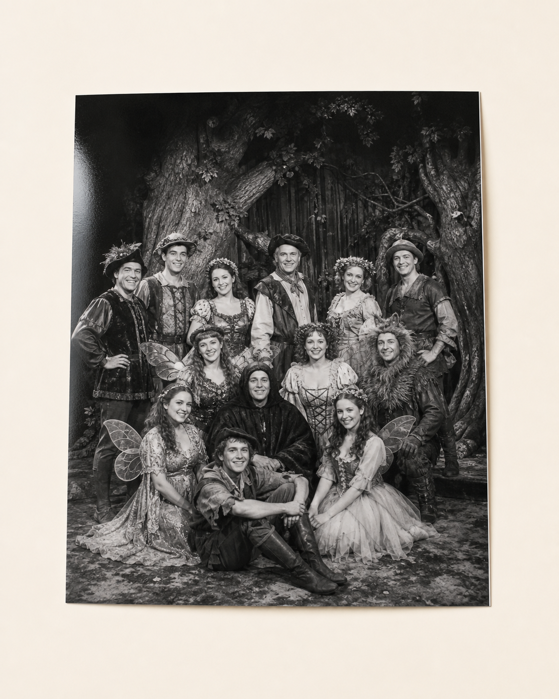 A black-and-white Into the Woods cast photograph.