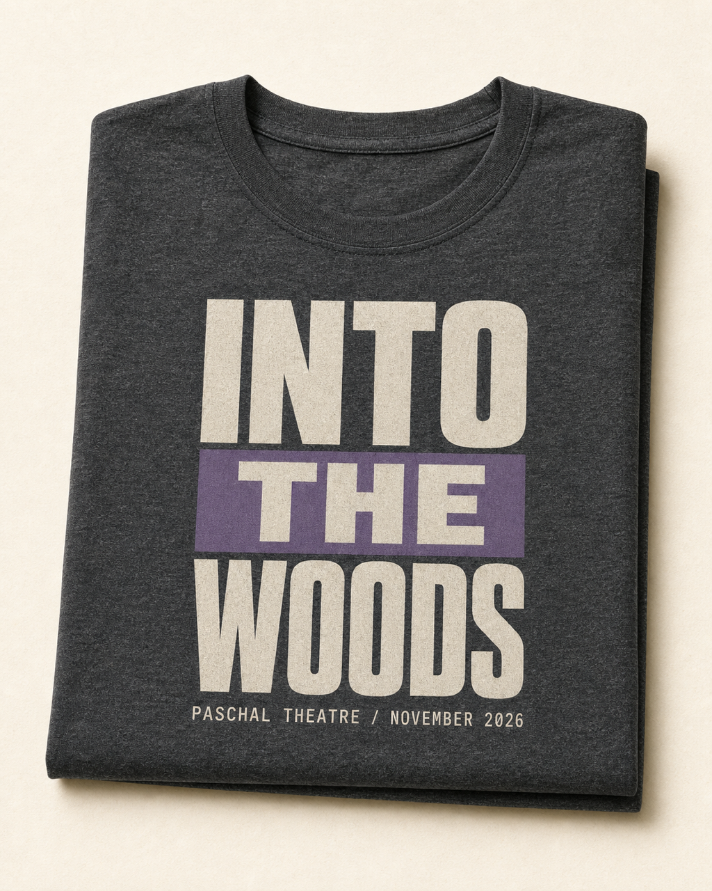 Heather charcoal t-shirt with the Into the Woods title screen-printed on the chest.